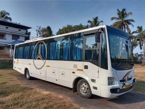 Executive Mini Coach AC bus rental service in kerala